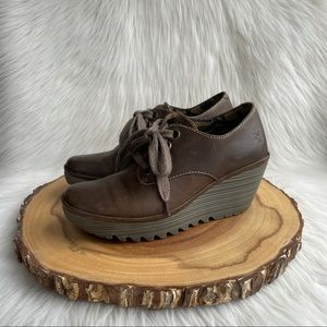 Fly London lace leather wedge booties